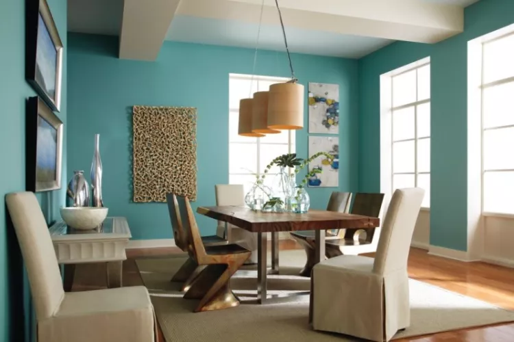 dining room with light teal walls