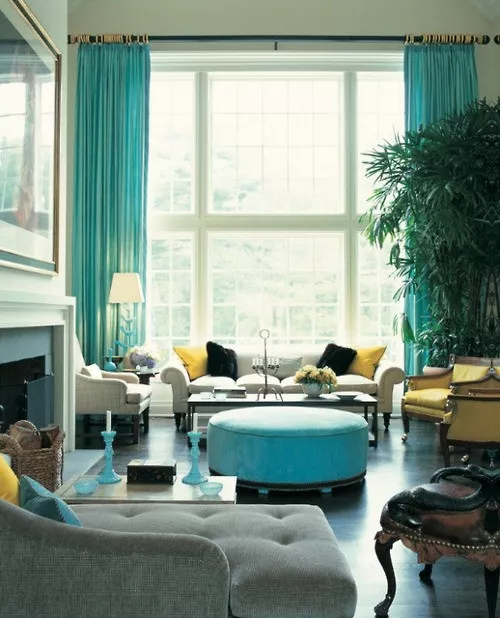eclectic living room decor with light teal drapings
